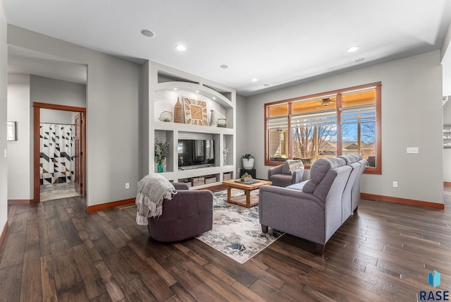 living room featuring recessed lighting, baseboards, built in features, and dark wood-style flooring