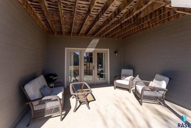 view of patio featuring french doors