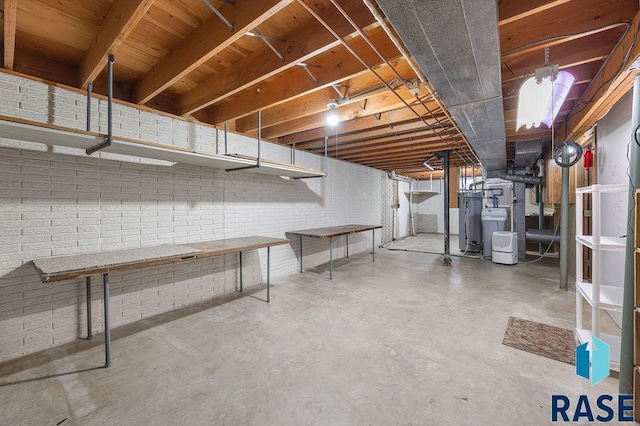 unfinished basement with brick wall