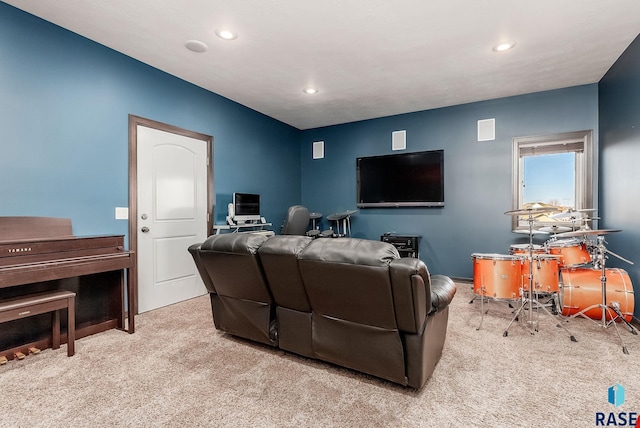 living area with recessed lighting and carpet floors