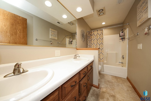 full bath with double vanity, shower / tub combo, toilet, and a sink