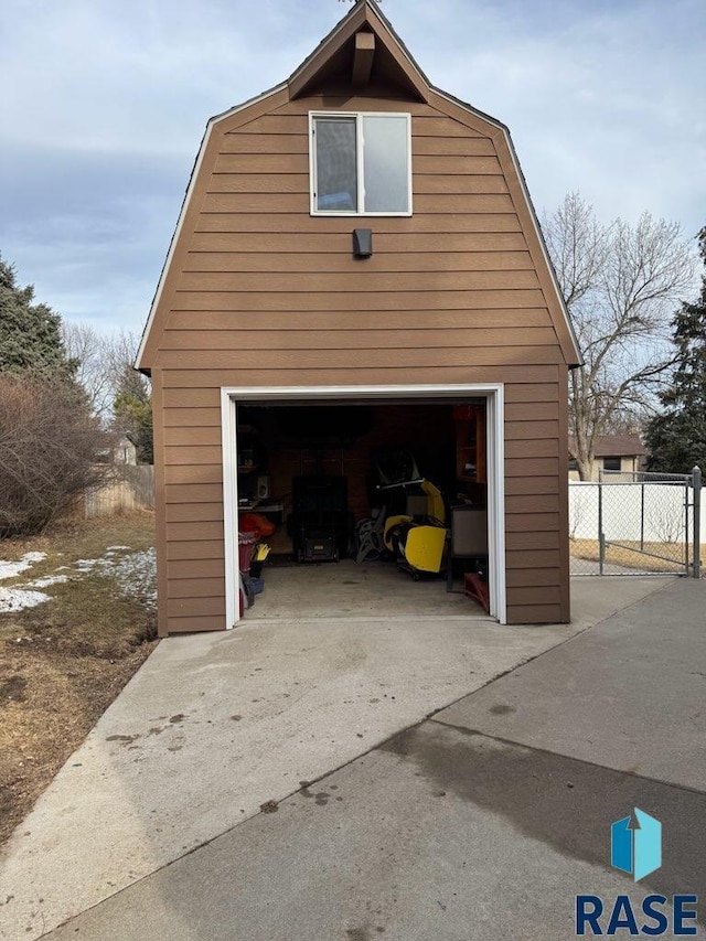 garage with fence