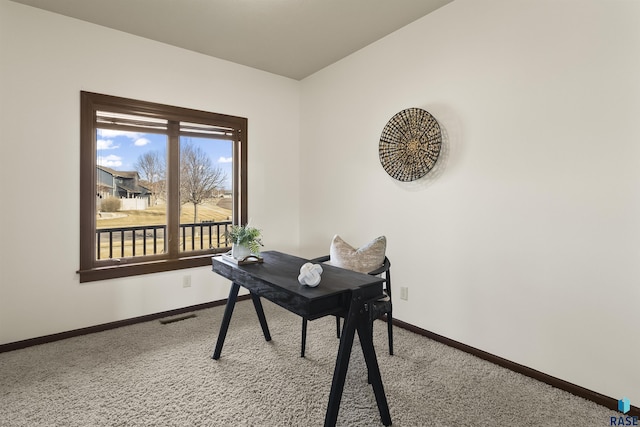 carpeted home office featuring baseboards and visible vents