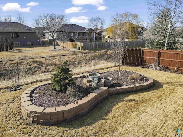 view of yard with a fenced backyard