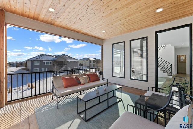 deck with a residential view and an outdoor hangout area