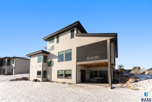 rear view of property with a patio area