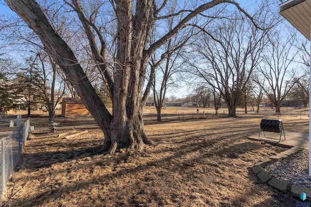 view of yard featuring fence