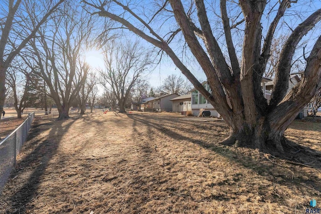 view of yard with fence