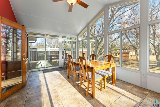 sunroom / solarium with a ceiling fan and lofted ceiling