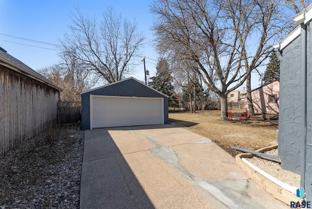 detached garage with fence