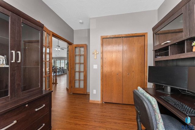 home office featuring wood finished floors, french doors, and ceiling fan