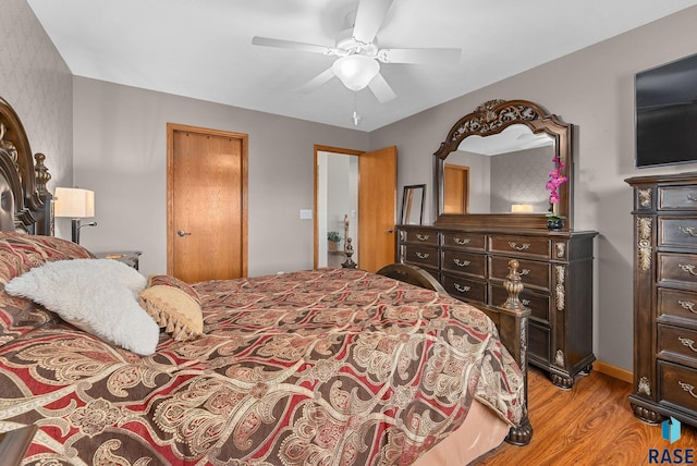 bedroom featuring a ceiling fan and light wood-style floors