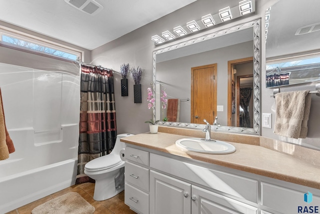 bathroom with tile patterned flooring, visible vents, toilet, shower / tub combo with curtain, and vanity