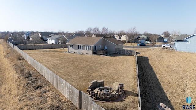 birds eye view of property with a residential view