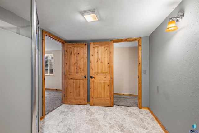 bedroom featuring baseboards