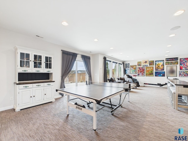 game room featuring recessed lighting, baseboards, light carpet, and visible vents