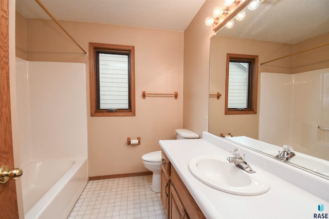 full bath featuring vanity, baseboards, shower / washtub combination, tile patterned floors, and toilet