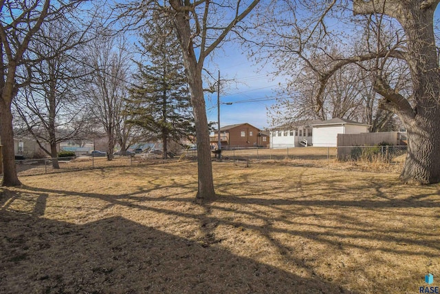 view of yard featuring fence