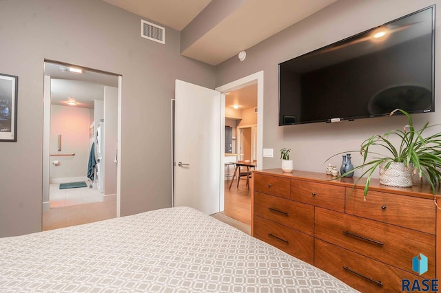 bedroom with visible vents