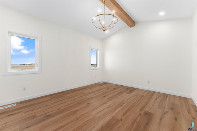 empty room with baseboards, visible vents, lofted ceiling with beams, light wood-style flooring, and a notable chandelier