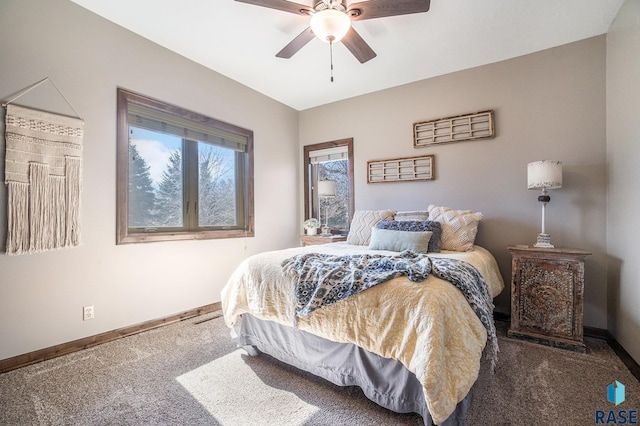 carpeted bedroom with baseboards and ceiling fan