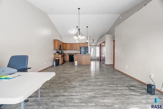 interior space featuring a notable chandelier, light wood-style flooring, high vaulted ceiling, and baseboards