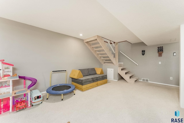 recreation room with recessed lighting, visible vents, baseboards, and carpet