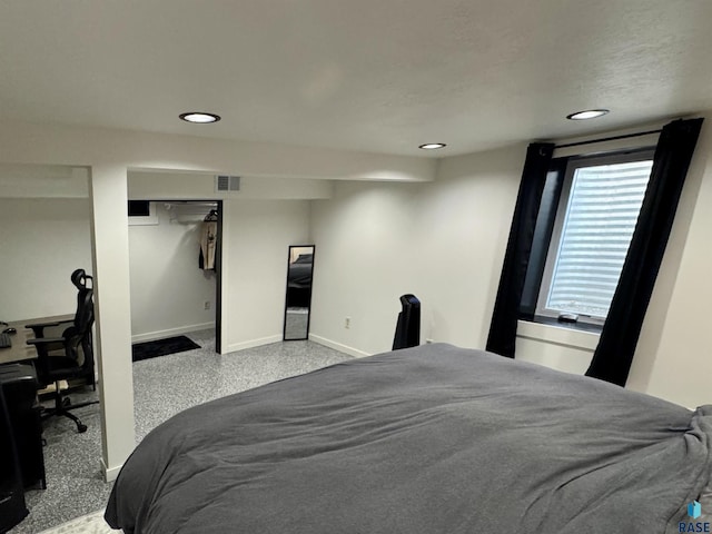 bedroom with visible vents, baseboards, recessed lighting, a closet, and speckled floor