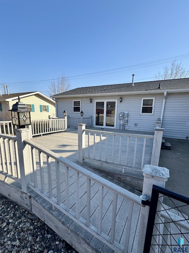 rear view of house with a deck