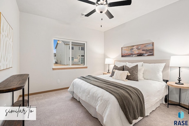 carpeted bedroom featuring a ceiling fan and baseboards