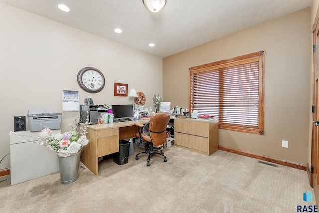 home office with recessed lighting, light colored carpet, visible vents, and baseboards