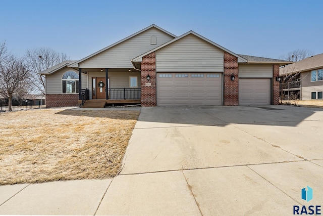 ranch-style house with brick siding, driveway, an attached garage, and a porch