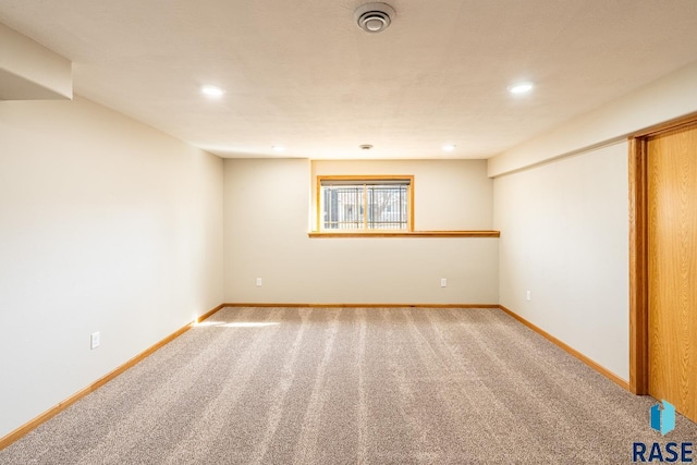 interior space with recessed lighting, baseboards, and carpet