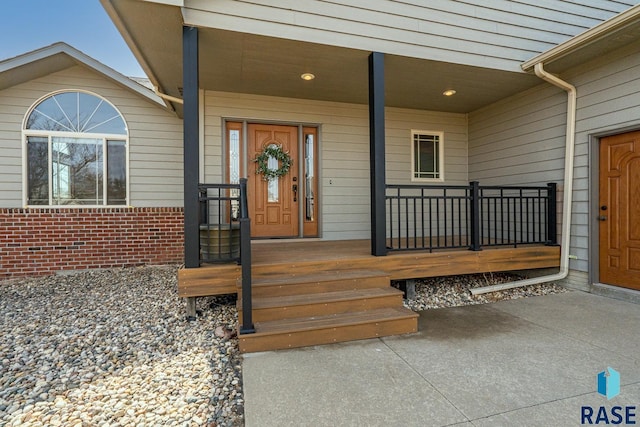 entrance to property with a porch