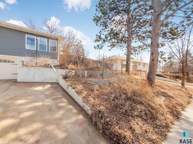 view of yard with an attached garage