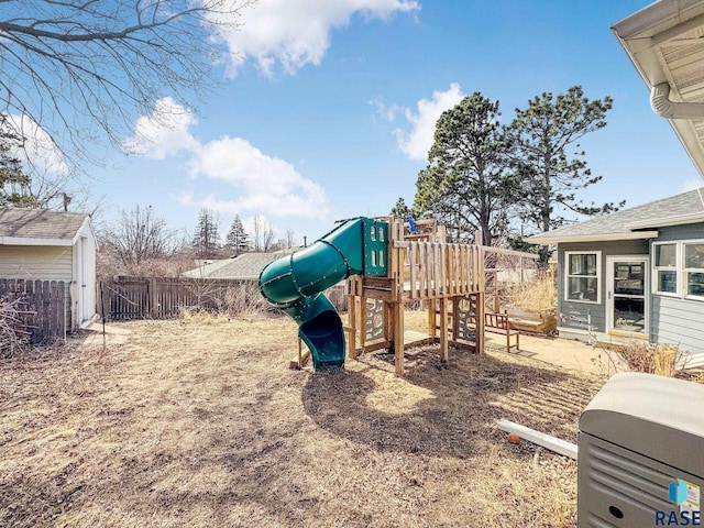 view of jungle gym with fence