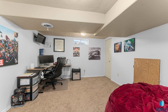 home office featuring visible vents, carpet floors, and baseboards