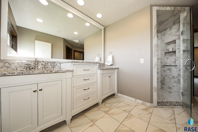 full bathroom featuring vanity, baseboards, recessed lighting, a stall shower, and marble finish floor