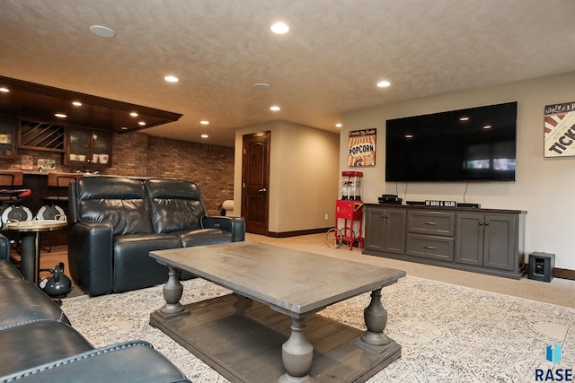 living area with brick wall, indoor bar, baseboards, light carpet, and recessed lighting