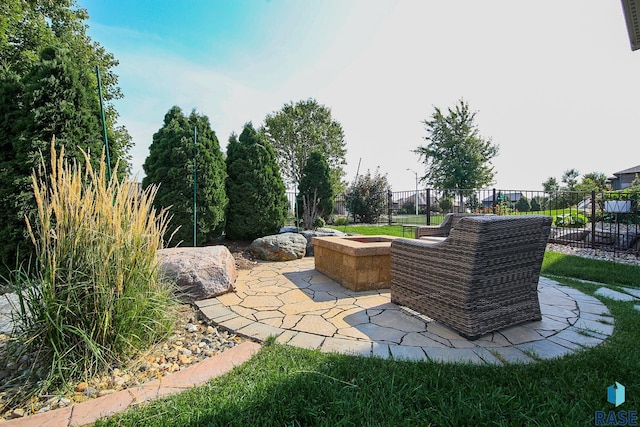 view of patio with visible vents and fence