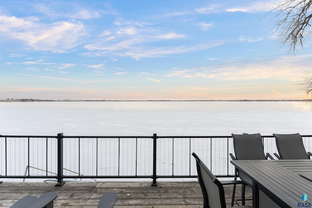 deck at dusk with a water view