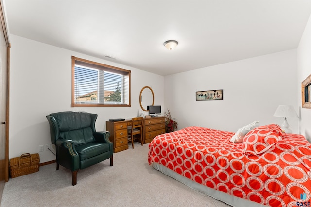 carpeted bedroom with visible vents