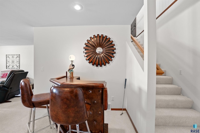 carpeted dining area featuring stairway, recessed lighting, and baseboards