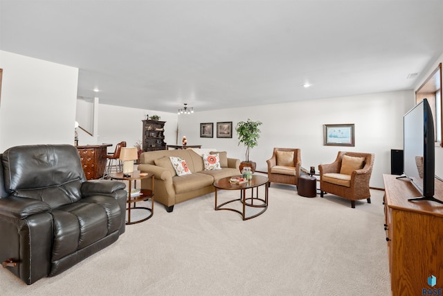 living room with recessed lighting and light carpet