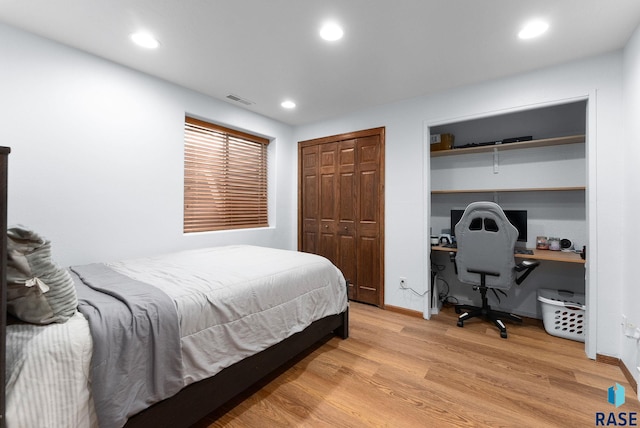 bedroom featuring recessed lighting, visible vents, baseboards, and light wood finished floors