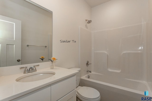 bathroom featuring shower / bath combination, toilet, and vanity