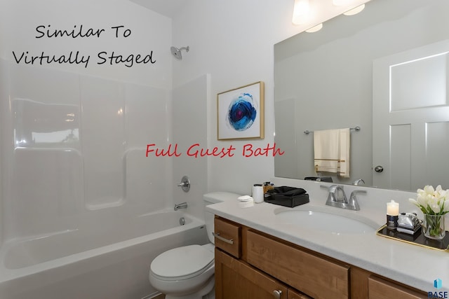 full bath featuring shower / washtub combination, toilet, and vanity