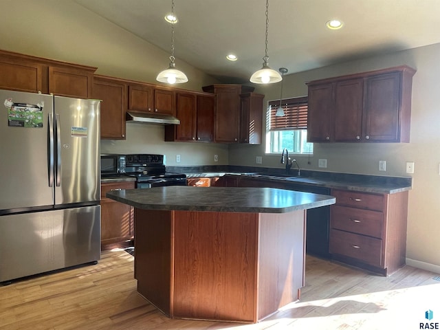 kitchen featuring a sink, black appliances, under cabinet range hood, dark countertops, and a center island