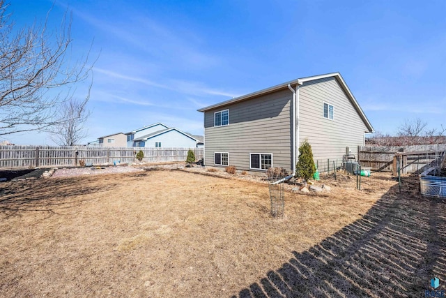 view of home's exterior with a fenced backyard