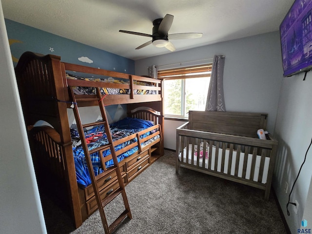 bedroom with a ceiling fan and carpet floors